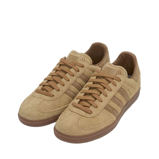 Brown suede Samba style trainers with lace-up front and gum sole