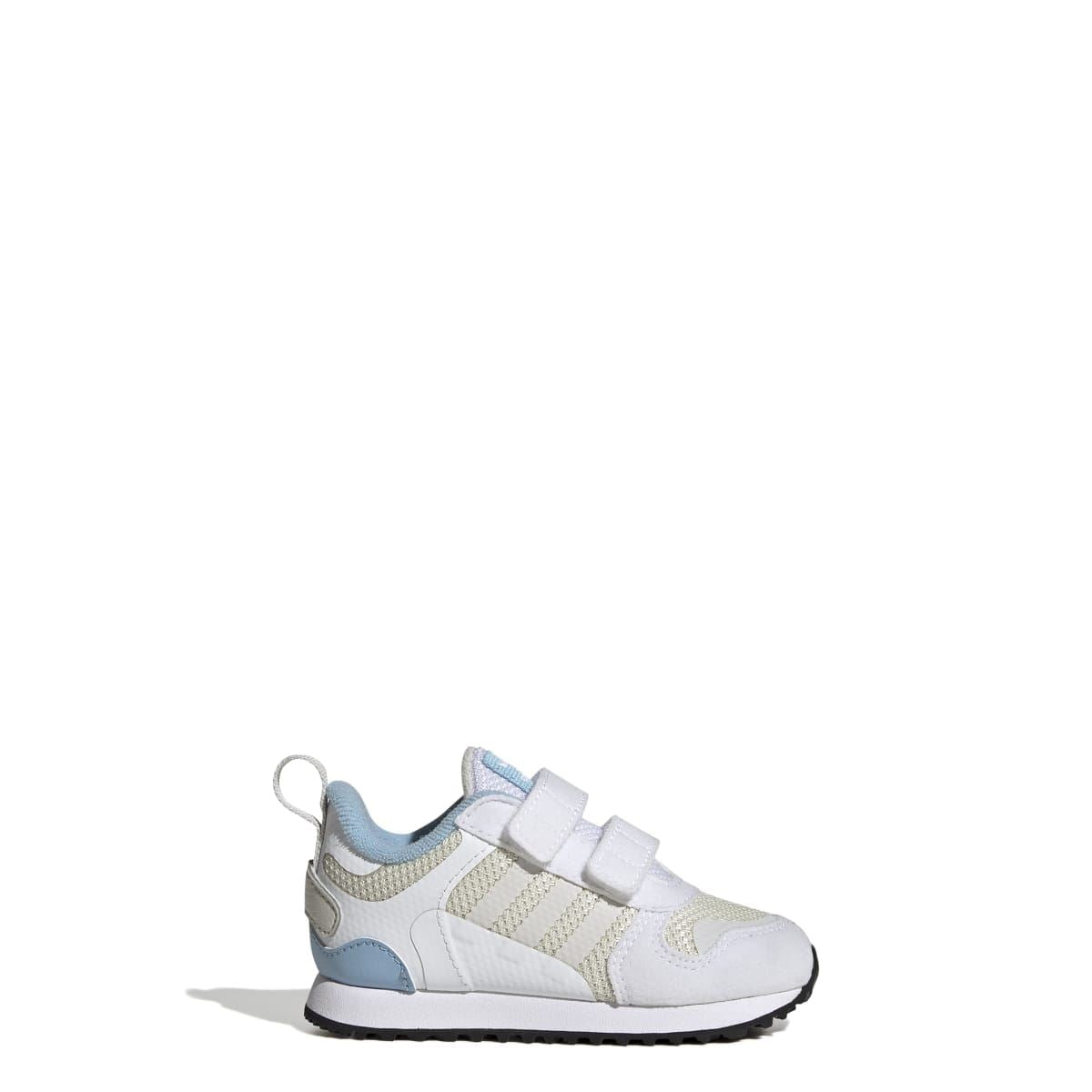 Infant white and light-blue low-top trainers with Velcro straps and chunky rubber sole