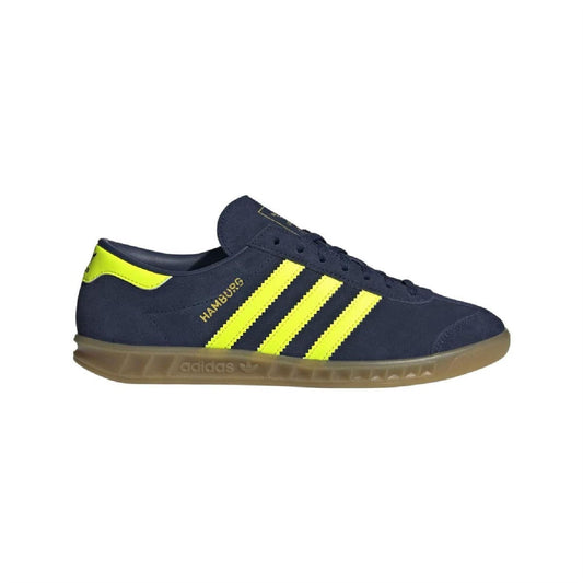 Dark navy adidas Hamburg low-top sneakers with neon yellow stripes and gum sole