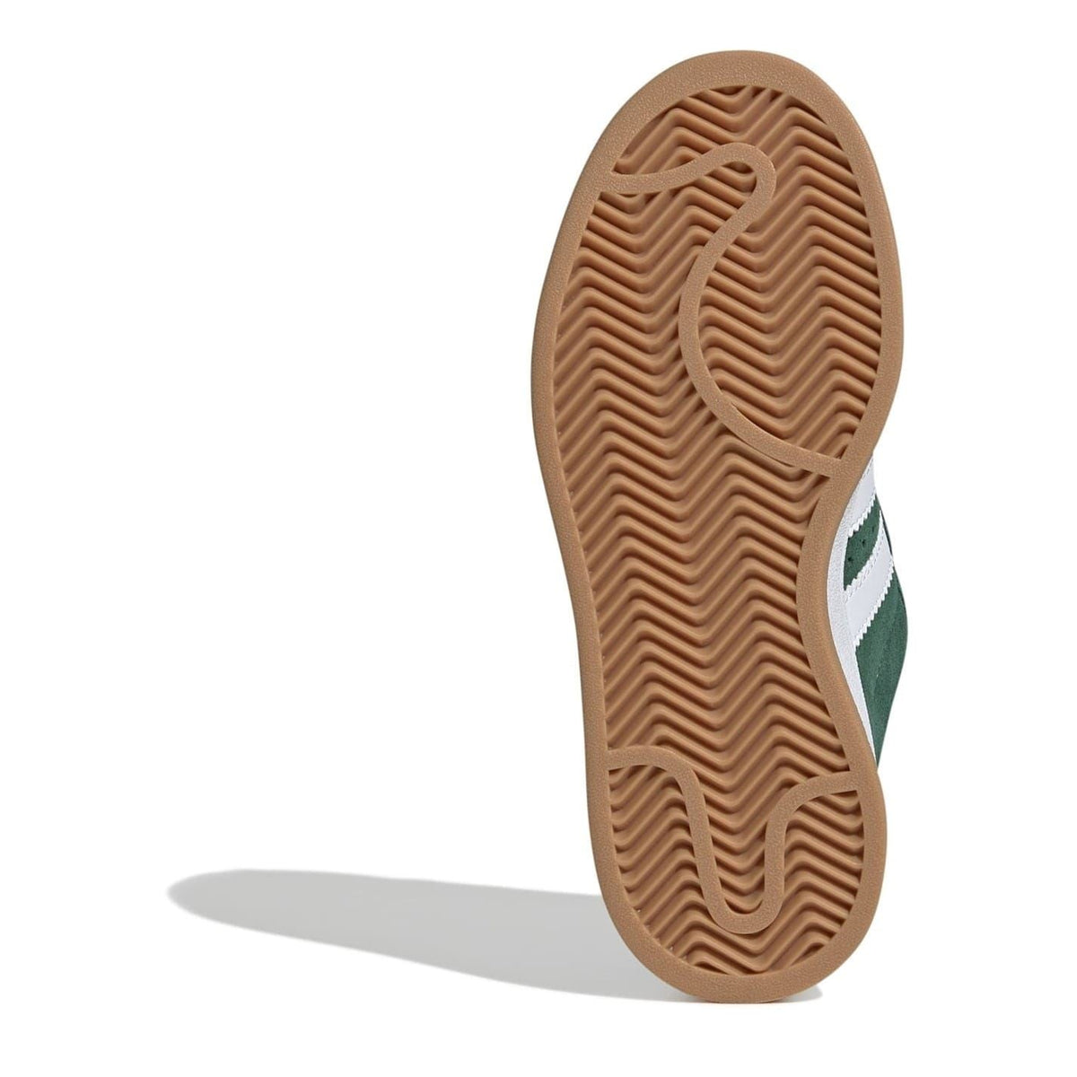 Juniors trainers outsole with gum-brown tread pattern and sidewall edge.