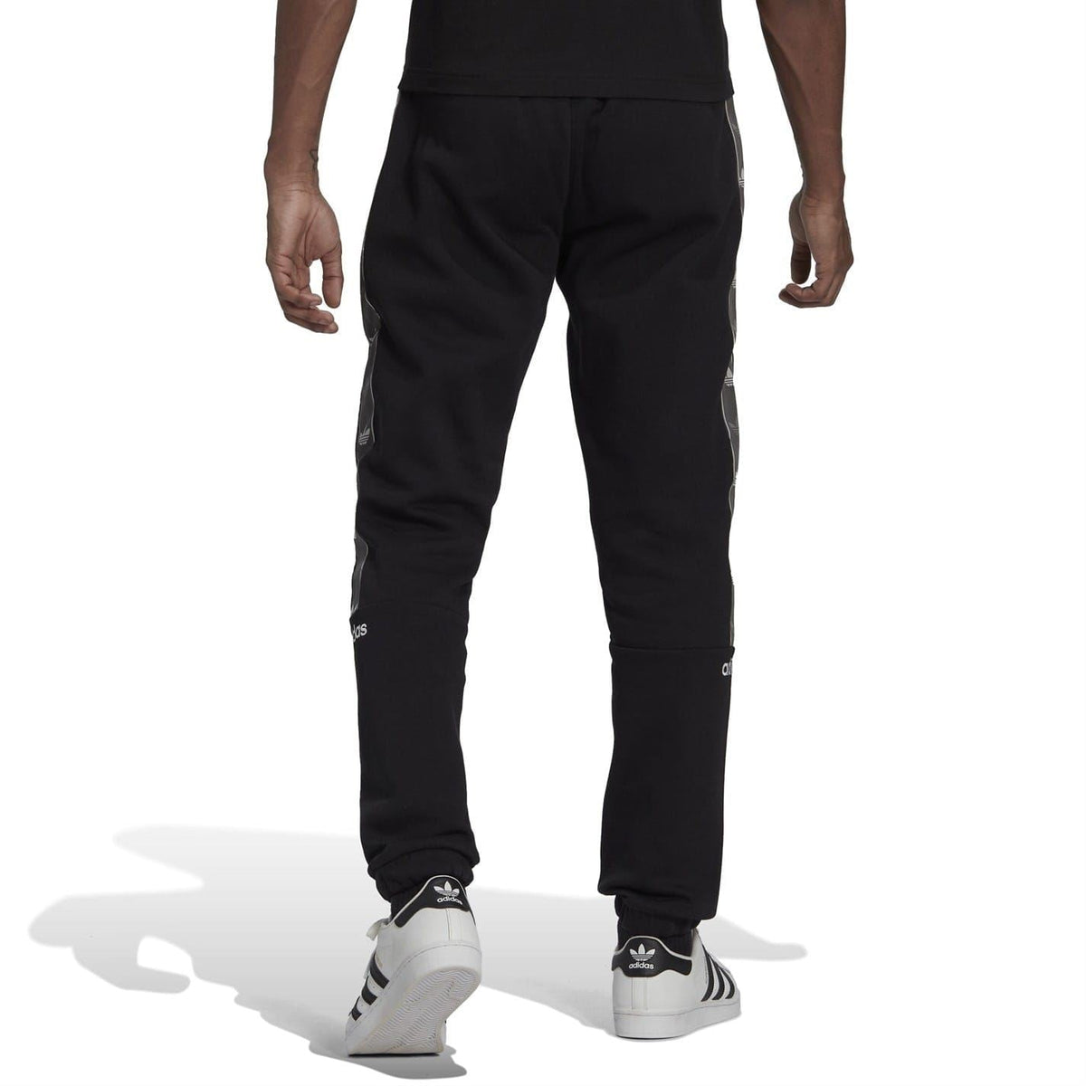 Black fleece joggers with elastic waistband and straight-to-tapered leg
