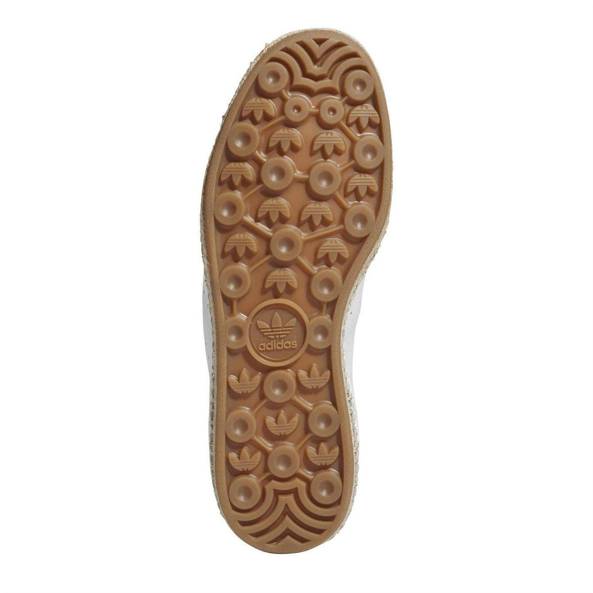 Sole view of adidas trainers with brown patterned outsole and signature branding