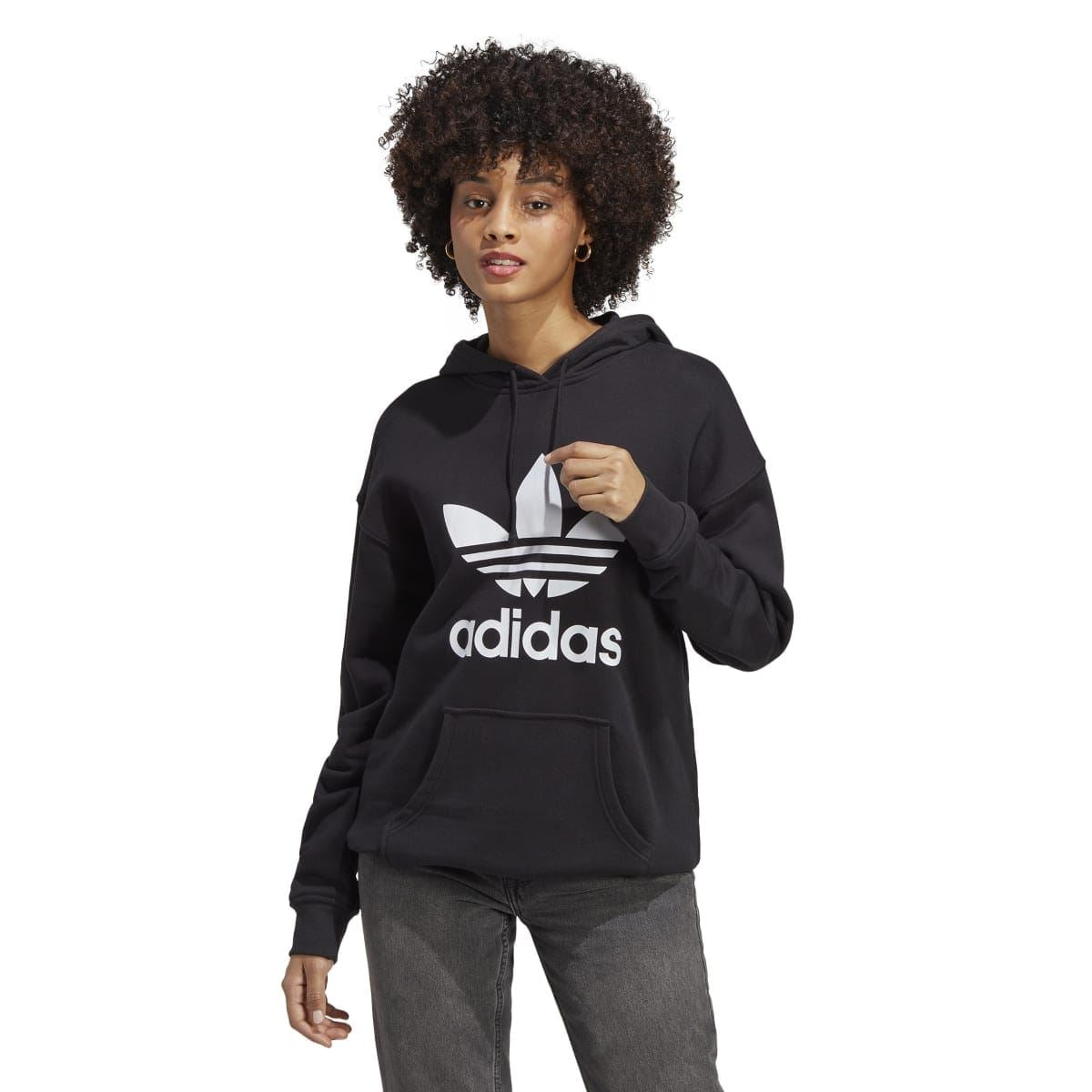 Black trefoil graphic hoody worn by model with adidas logo front