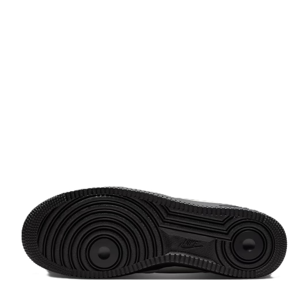 Nike Air Force 1 '07 low-top outsole view with black traction tread and circular pads