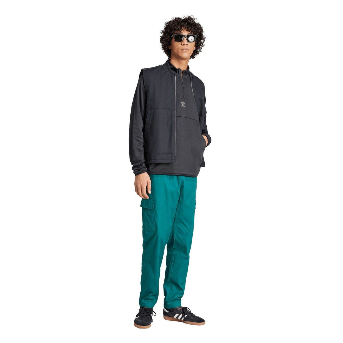 Black adidas quarter-zip top with stand collar and zip placket