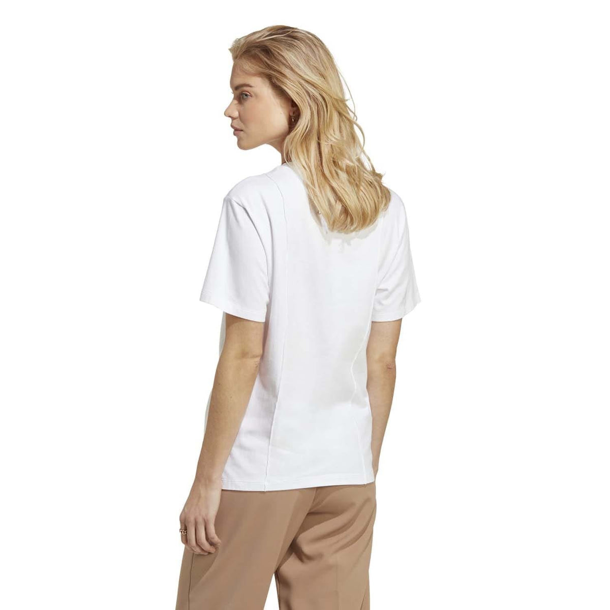 White crew-neck short-sleeve T-shirt, side view, with small chest logo