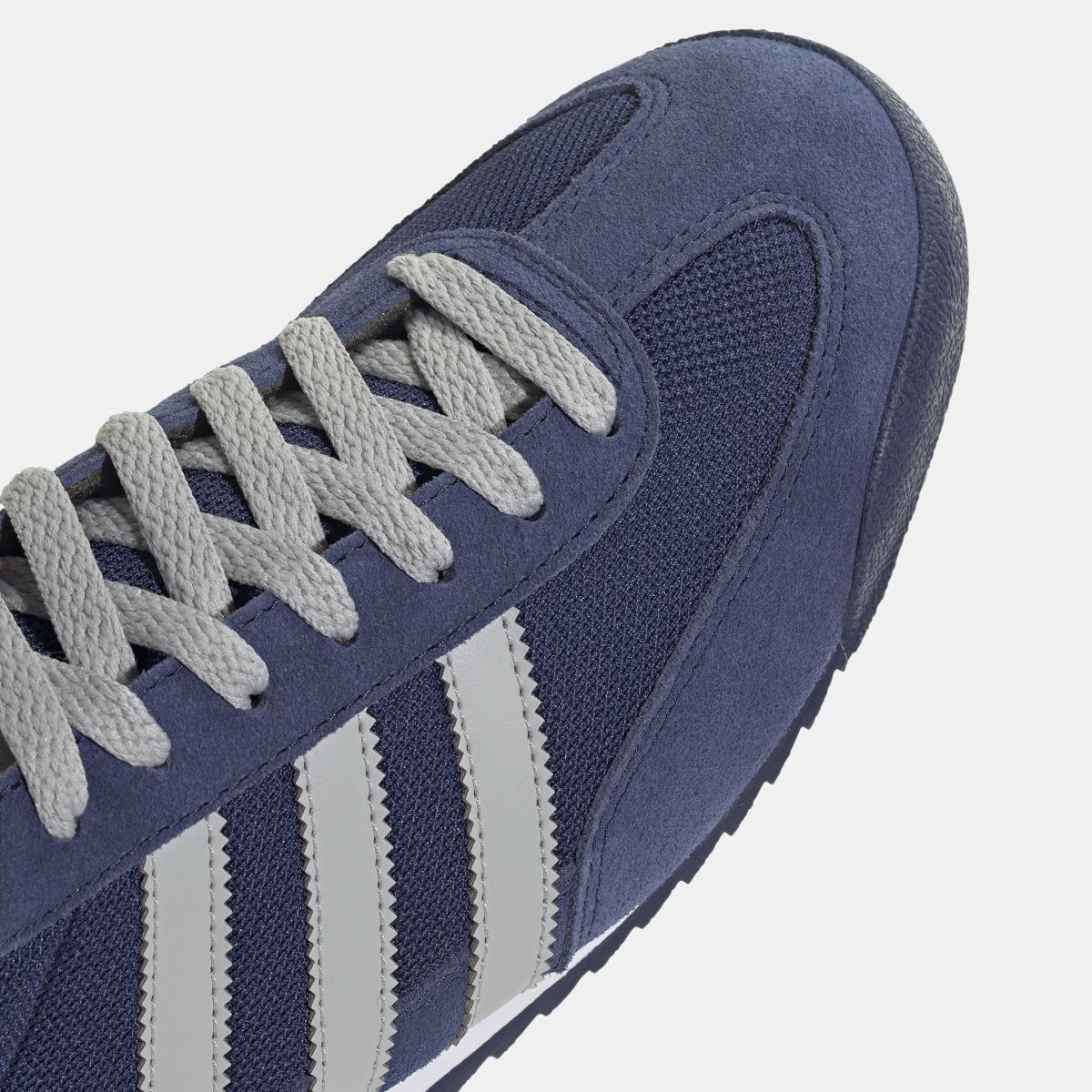 adidas Originals R71 shoes in black and white with classic sneaker design, showcasing comfortable footwear style.