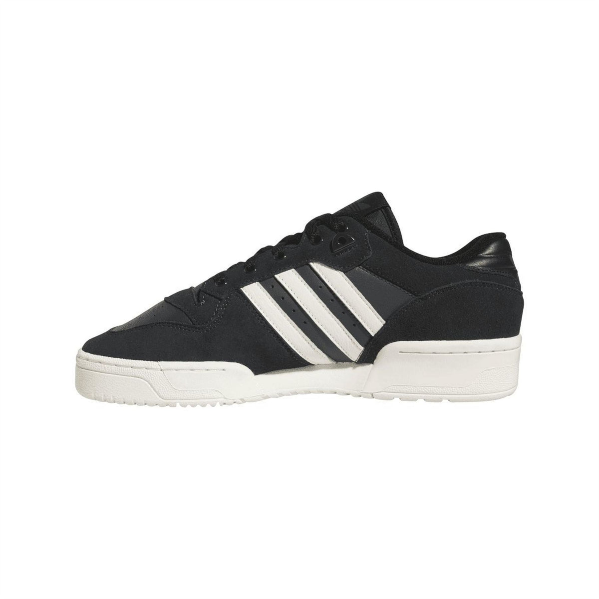 Black low-top trainers with three white stripes and lace-up front