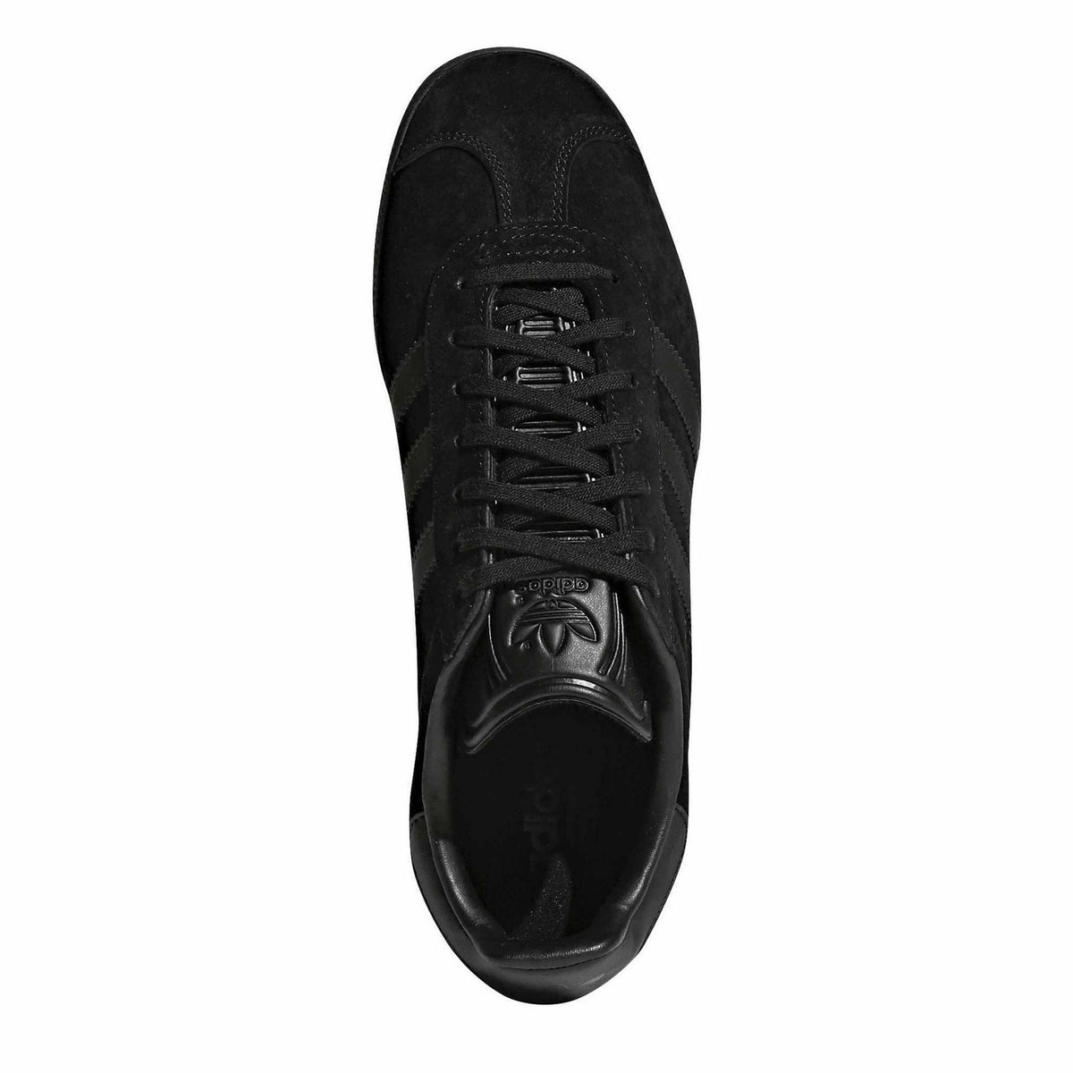 Black suede sneaker showing lace-up front and adidas tongue badge.