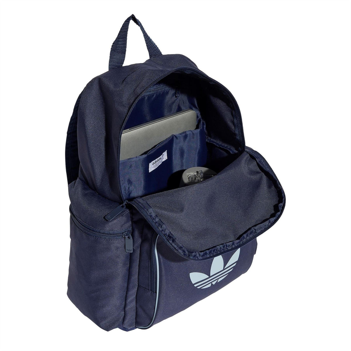 Night Indigo backpack open to show interior compartments and adidas trefoil front pocket