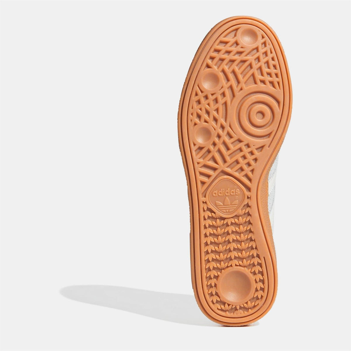 Orange rubber outsole with tread pattern and adidas trefoil logo