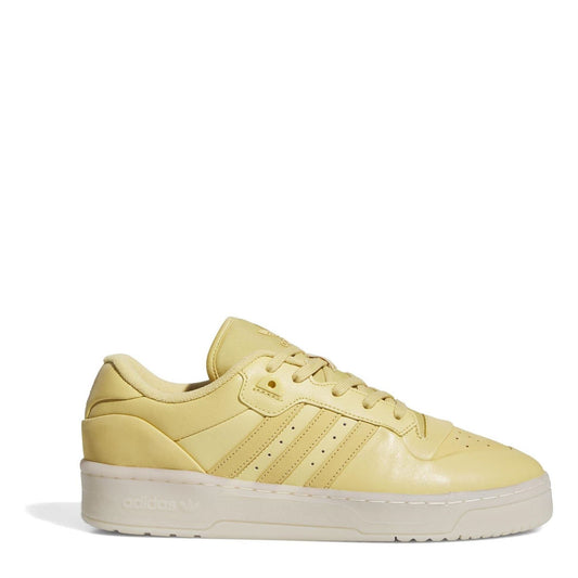 adidas Rivalry low-top flatform sneaker, yellow leather upper with three stripes