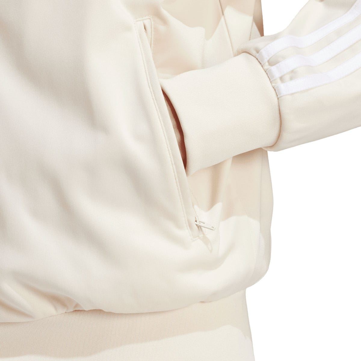adidas Originals white track top sleeve close-up: zip pocket and ribbed cuff