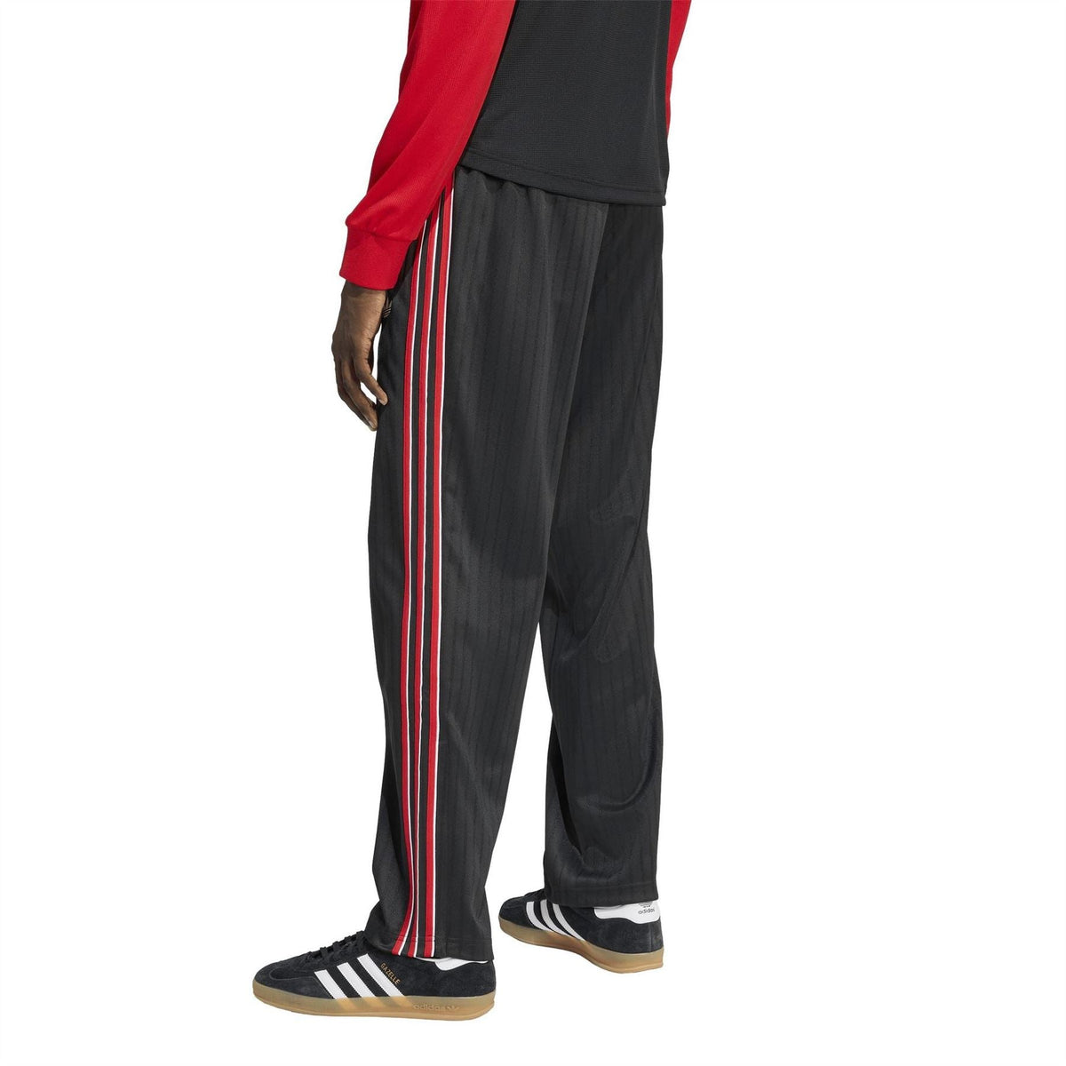 Men's black jogger pants with open hem, elastic cuff, and red-and-white side stripes