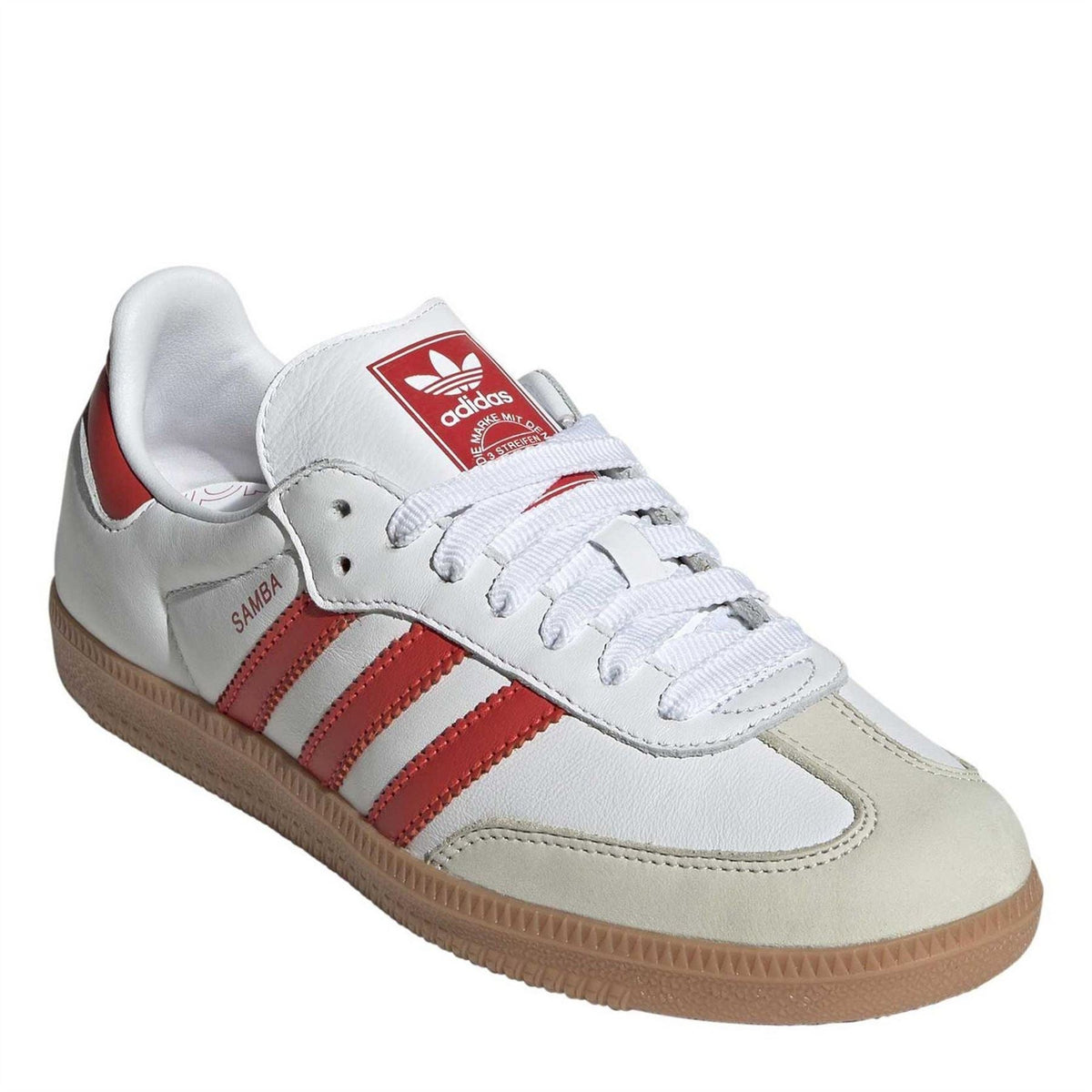adidas Samba OG sneakers, front three-quarter view, white upper with red stripe overlays