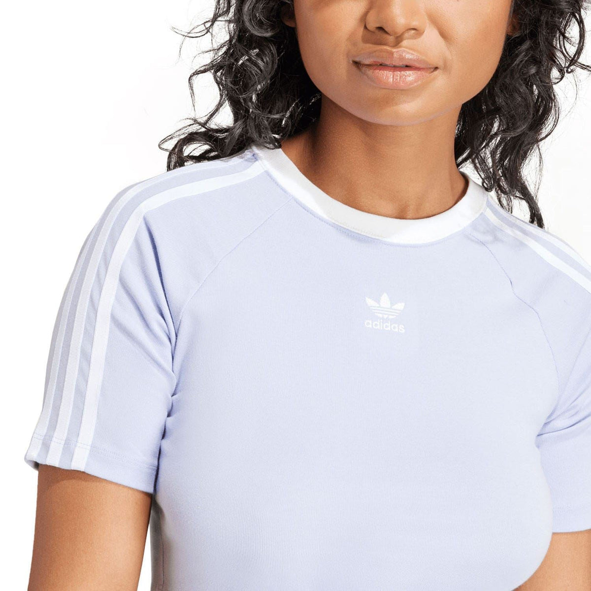 Light blue baby t-shirt close-up with crew neck and small adidas logo
