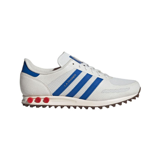 adidas Originals trainers in white with blue three stripes and red studded outsole