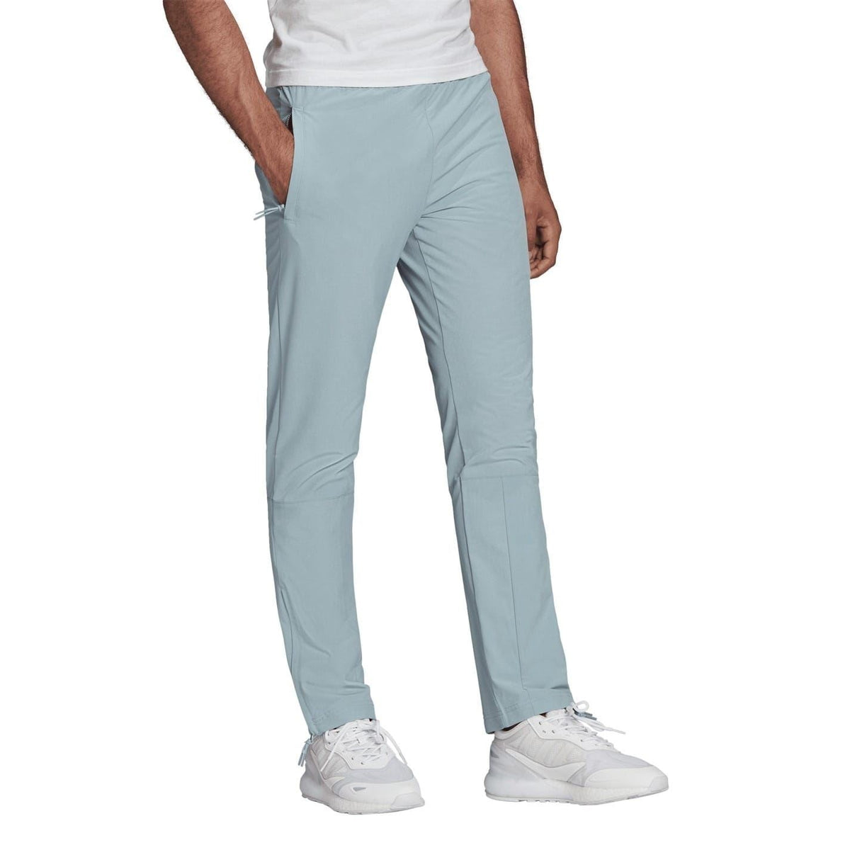 Light blue jogger track pants with elastic waist, drawstring, tapered fit, ankle cuffs.