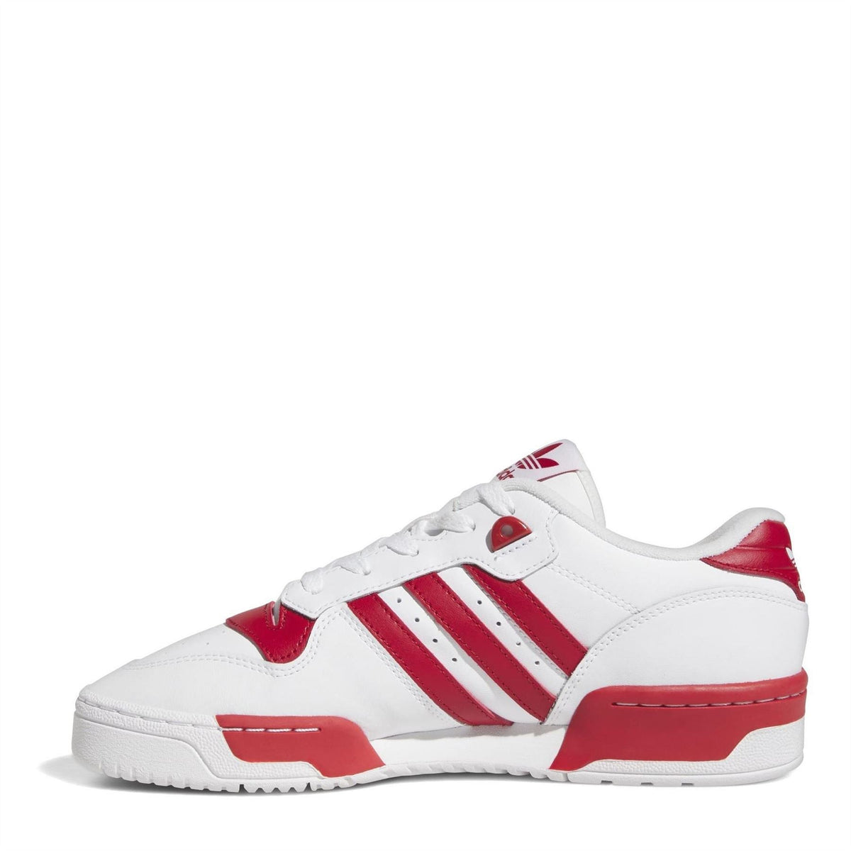 White adidas Originals Rivalry low-top trainers with red toe caps and three stripe branding