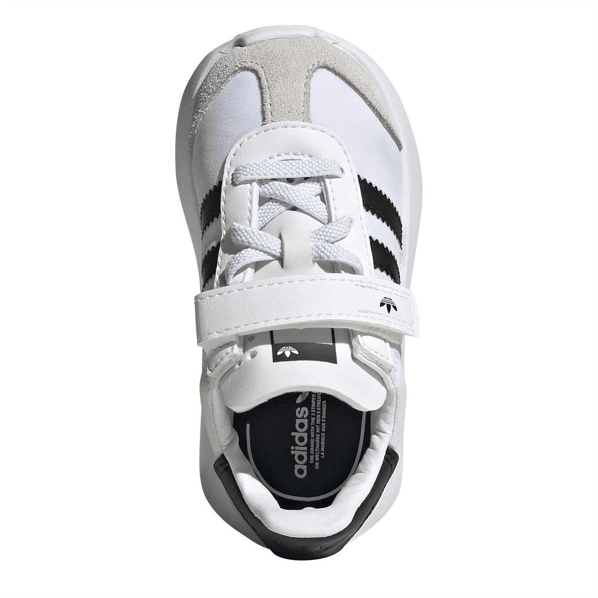 Juniors sneaker top view with laces, adidas logo on strap, black three stripes