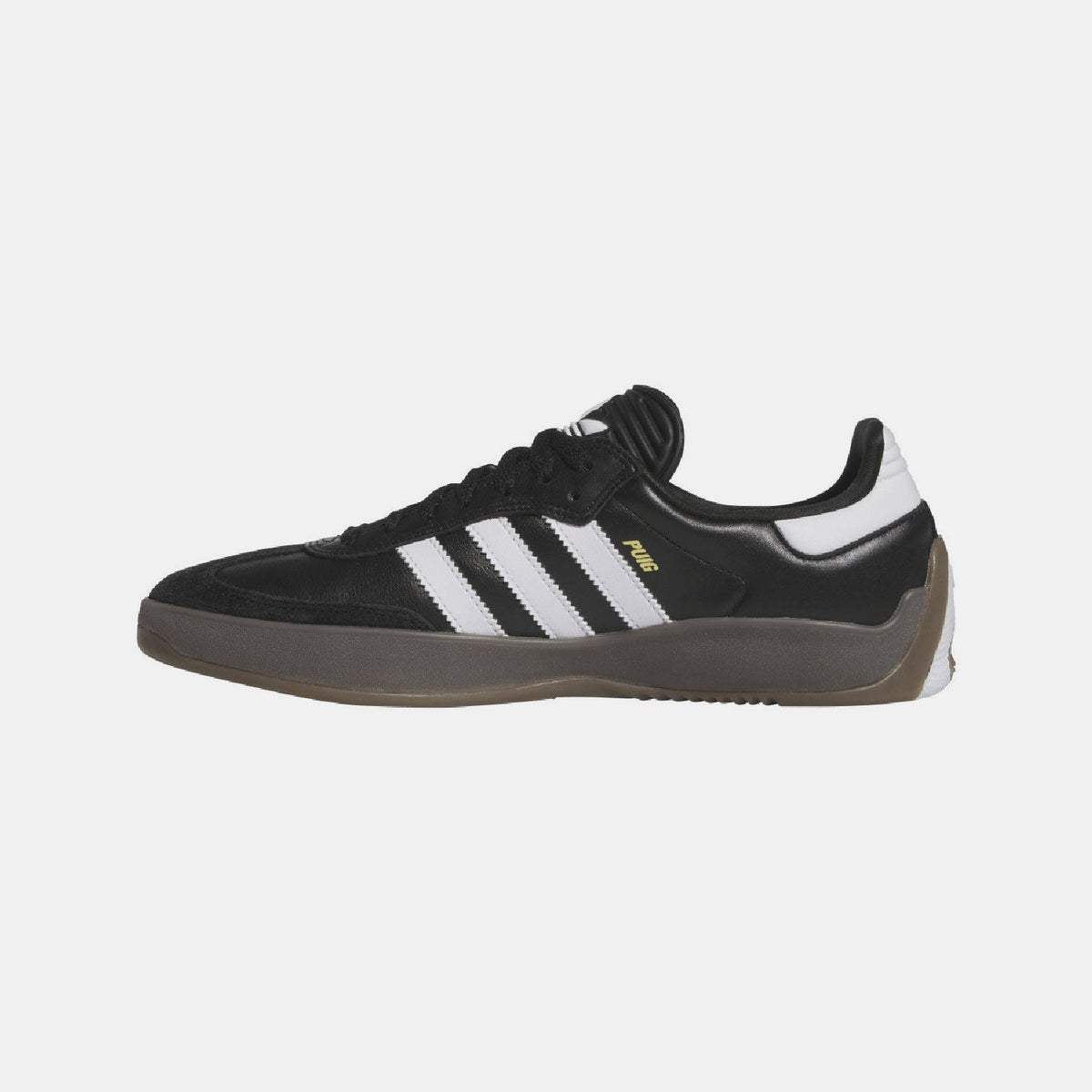 Black low-top trainers with white triple stripes and black lace-up closure