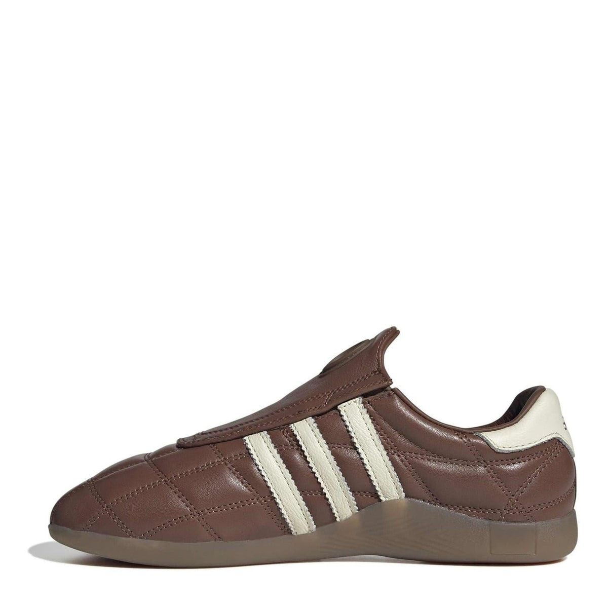 Brown and cream adidas Originals low top sneakers, side view with three stripes.