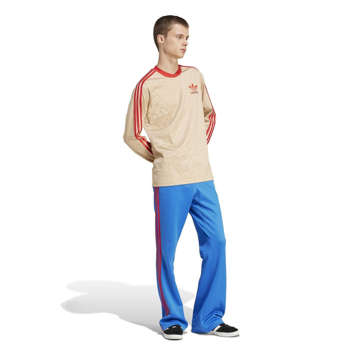 Beige long-sleeve t-shirt with red sleeve stripes and adidas chest logo
