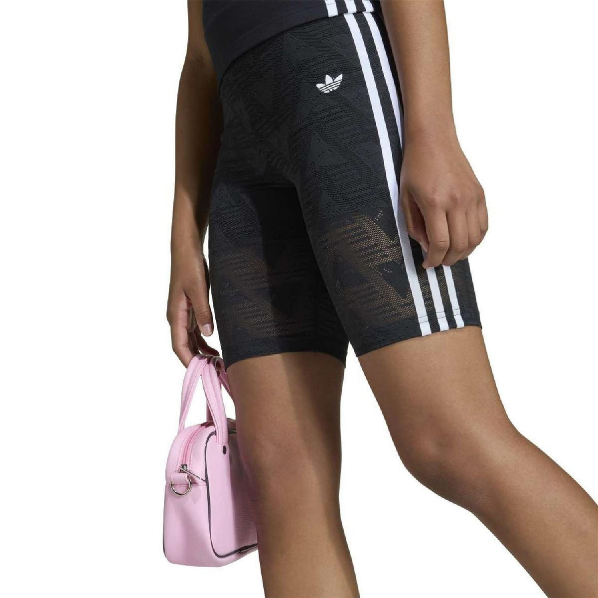 Juniors’ black geometric shorts with white side stripes and small adidas trefoil logo
