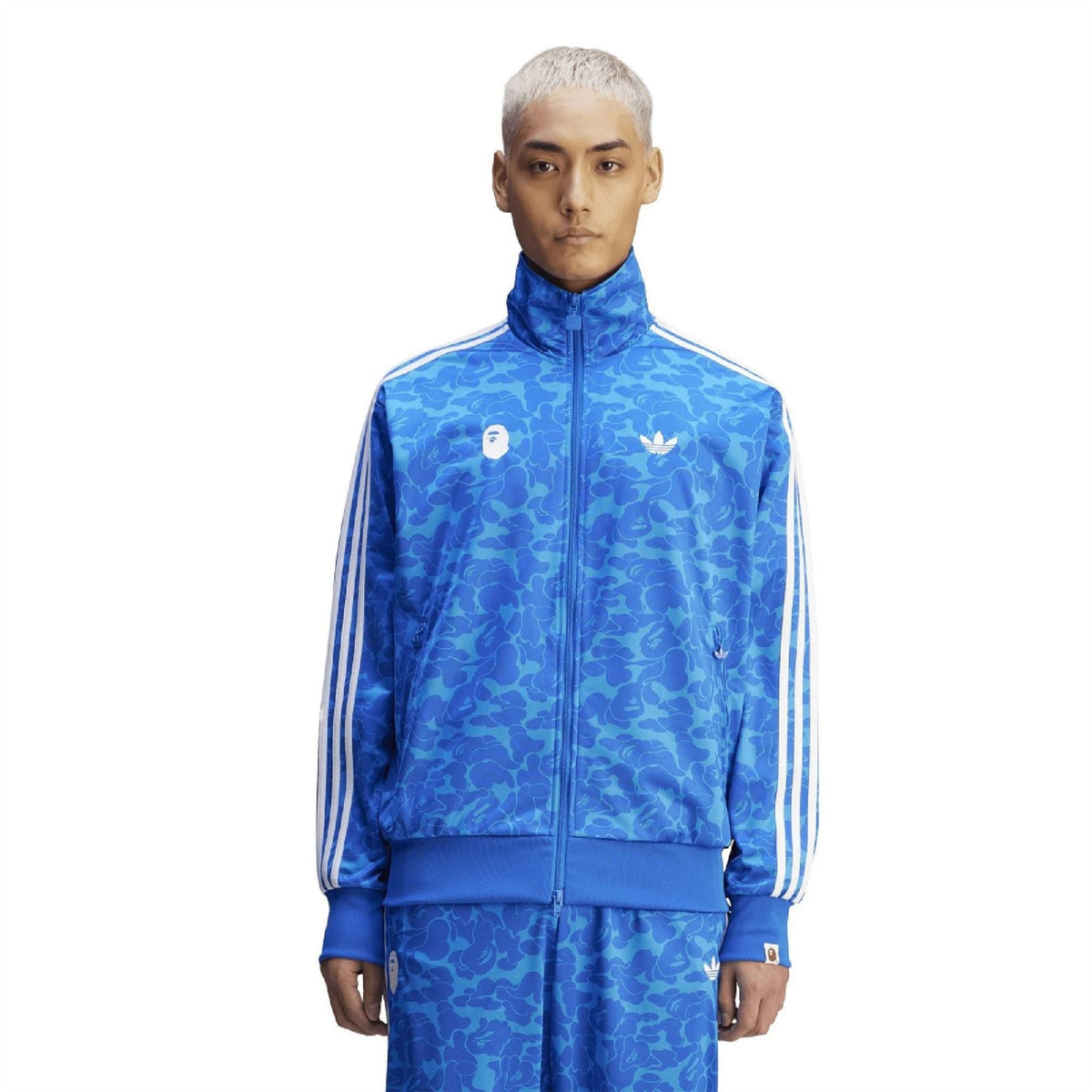 Blue camo track top with full zip, high collar, and white side stripes