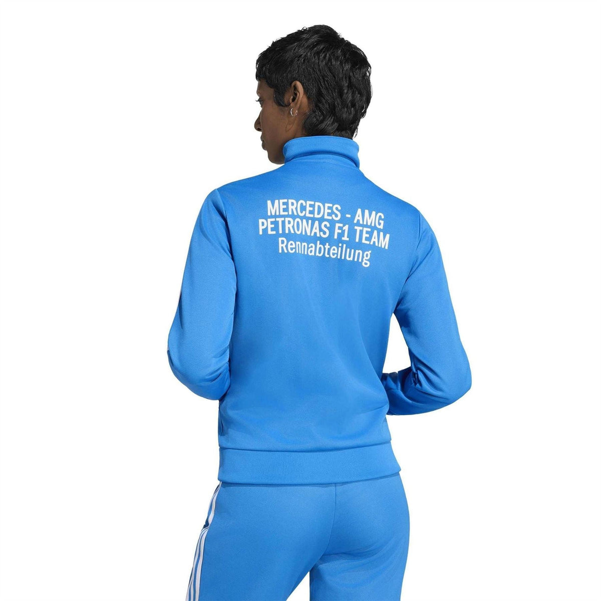 Blue track top with back text 'MERCEDES-AMG PETRONAS F1 TEAM' and white sleeve stripes.