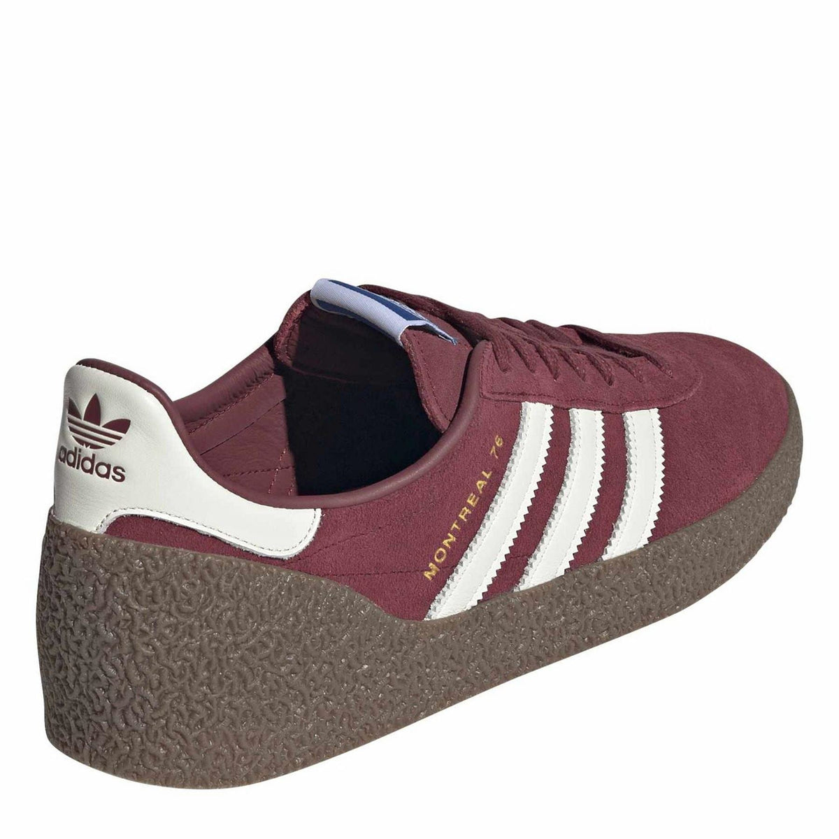 Maroon canvas sneakers with white heel patch, three stripes, and lace-up collar