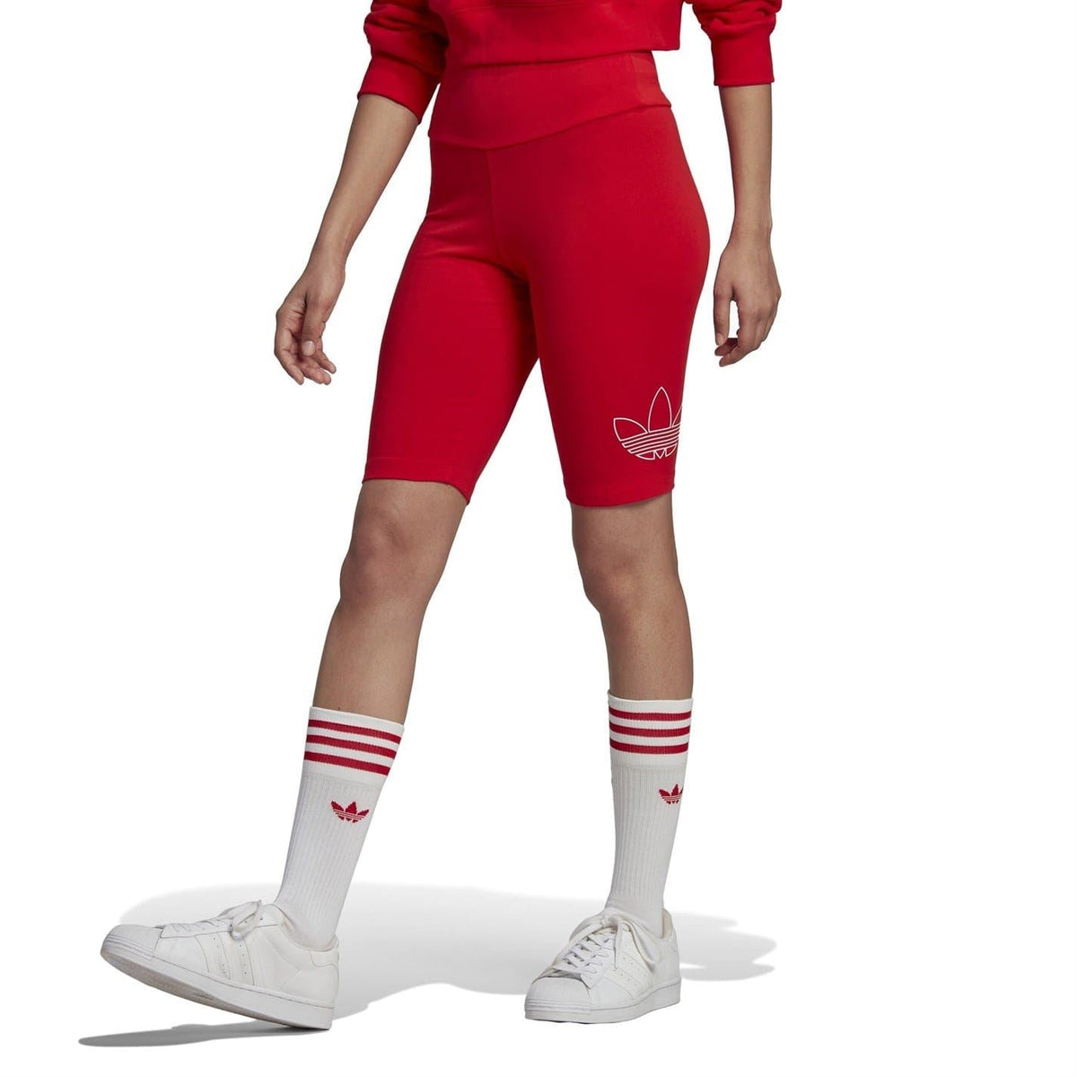 Red slim-fit biking athletic shorts with adidas trefoil logo at side leg