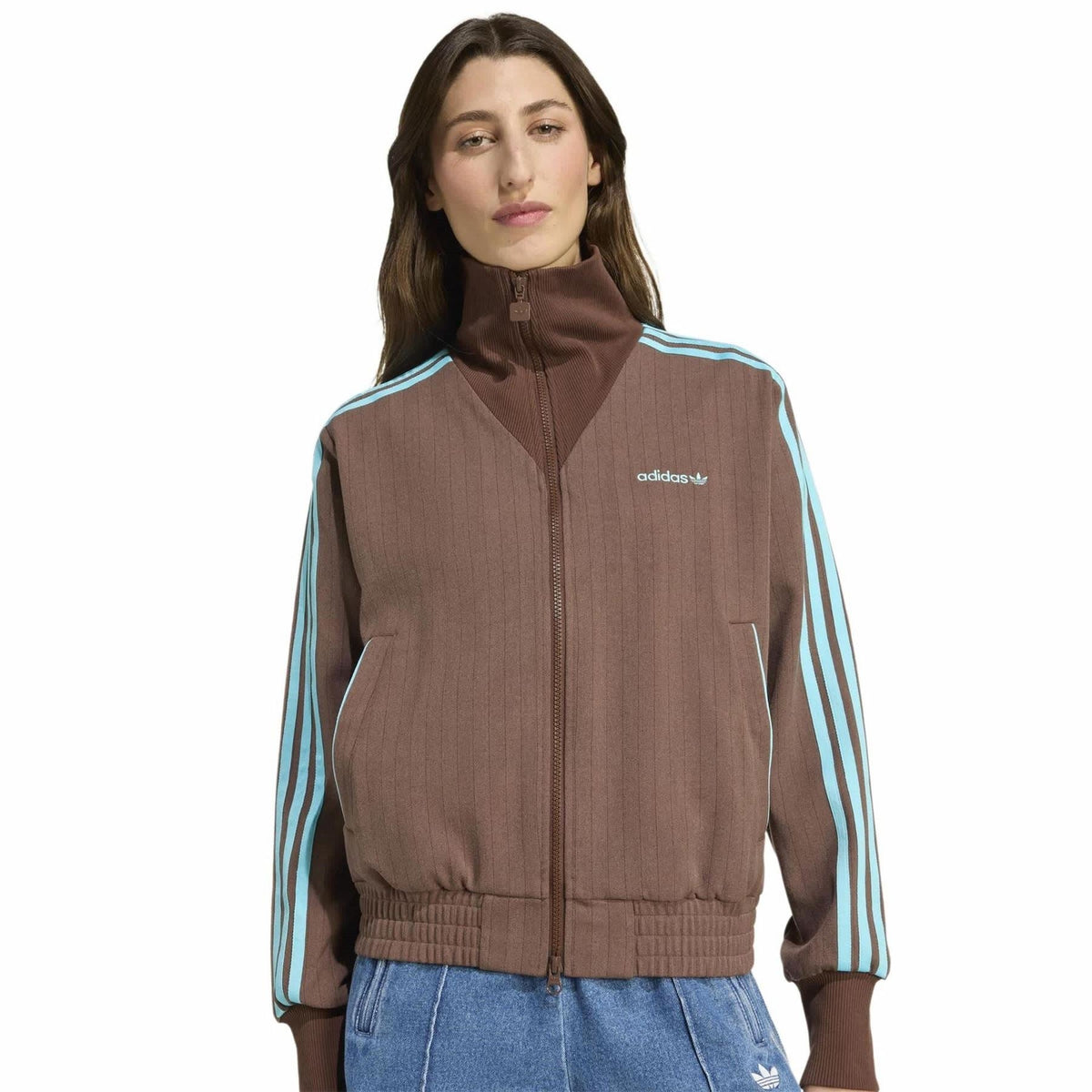 Brown zip-front track jacket with stand collar, adidas logo, and turquoise stripe side panels