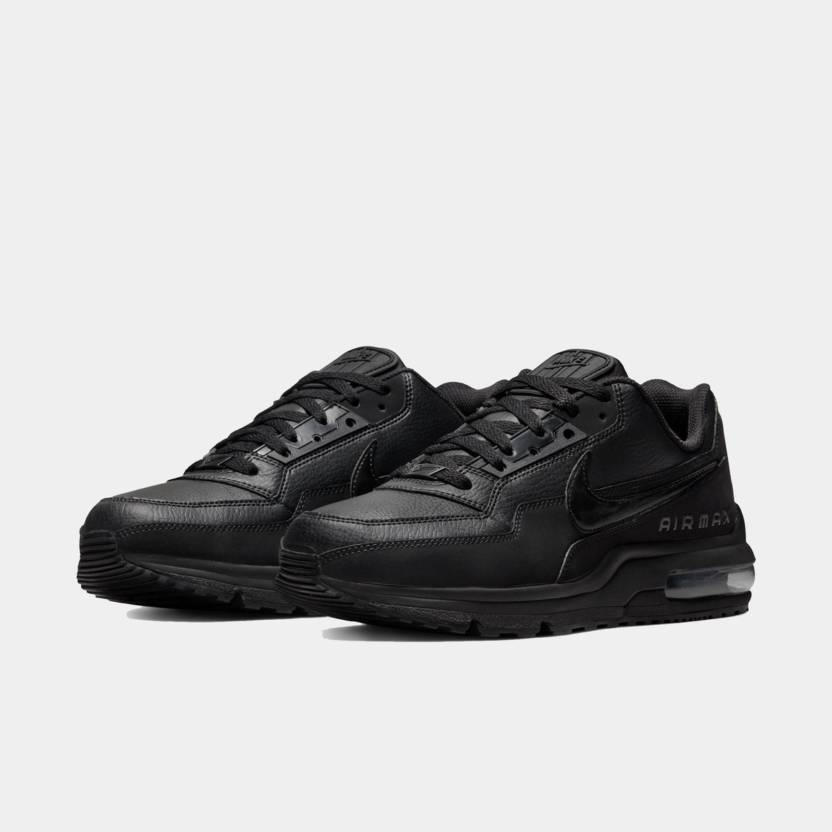 Nike Air Max LTD 3 black leather sneakers, side view with swoosh and Air unit