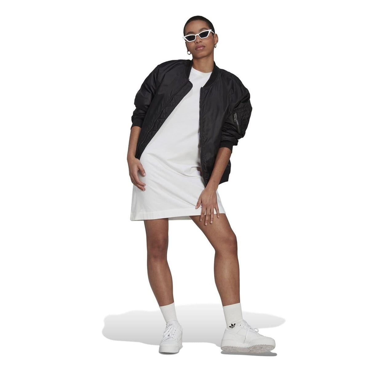 adidas Originals women's T-shirt dress, casual top with short sleeves and relaxed fit, displayed on a hanger.