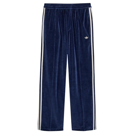 adidas Originals navy velour track pants with white side stripes and adidas trefoil logo