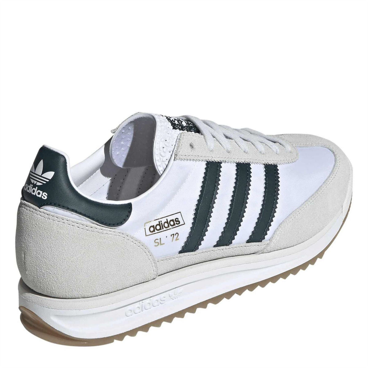 White and gray low-top sneakers with black heel tab, black stripes, and lace-up