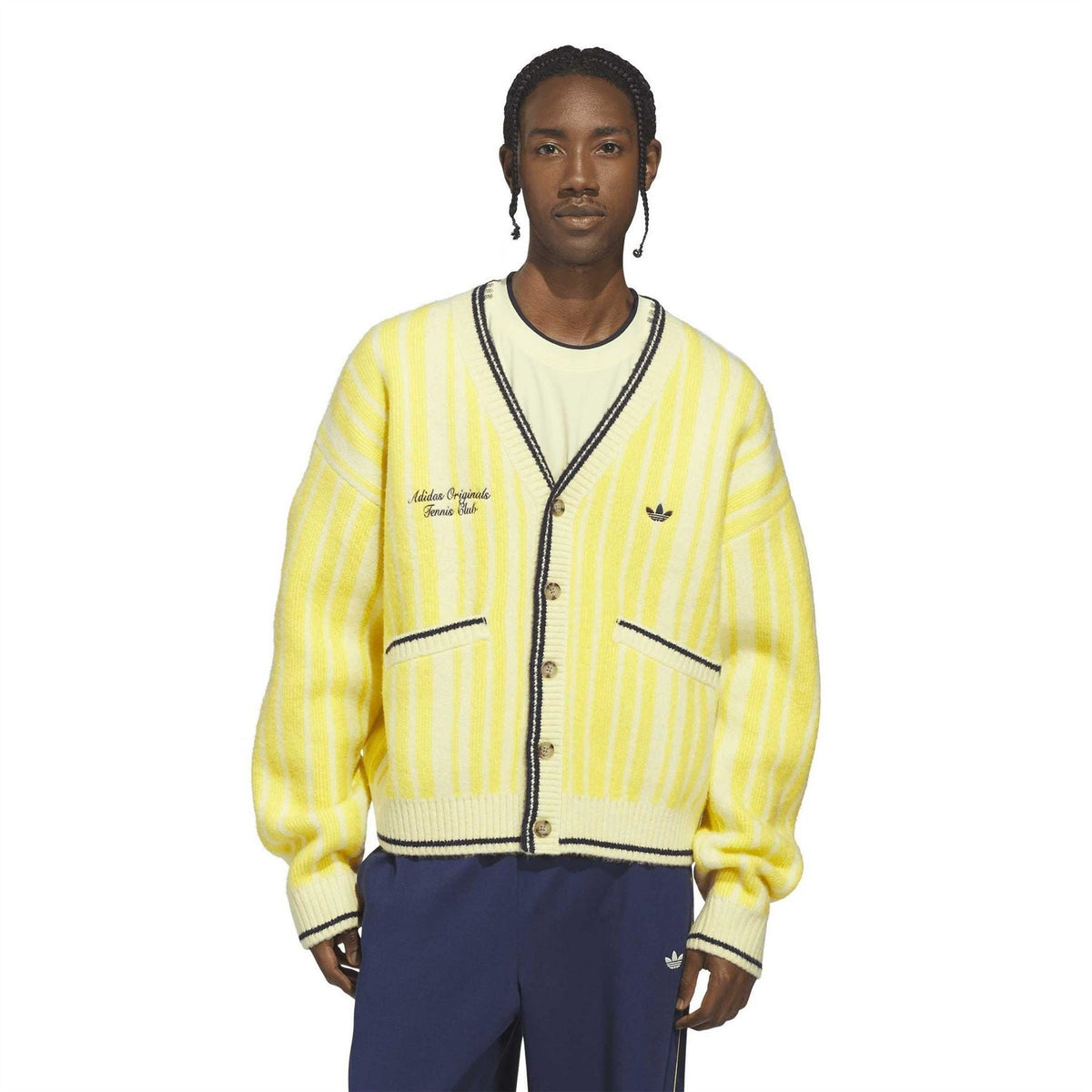 Yellow striped cardigan with navy V-neck trim, button closure, and front patch pockets.