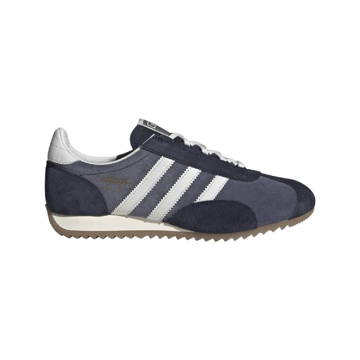Navy suede trainers with white three-stripe design and gum rubber sole