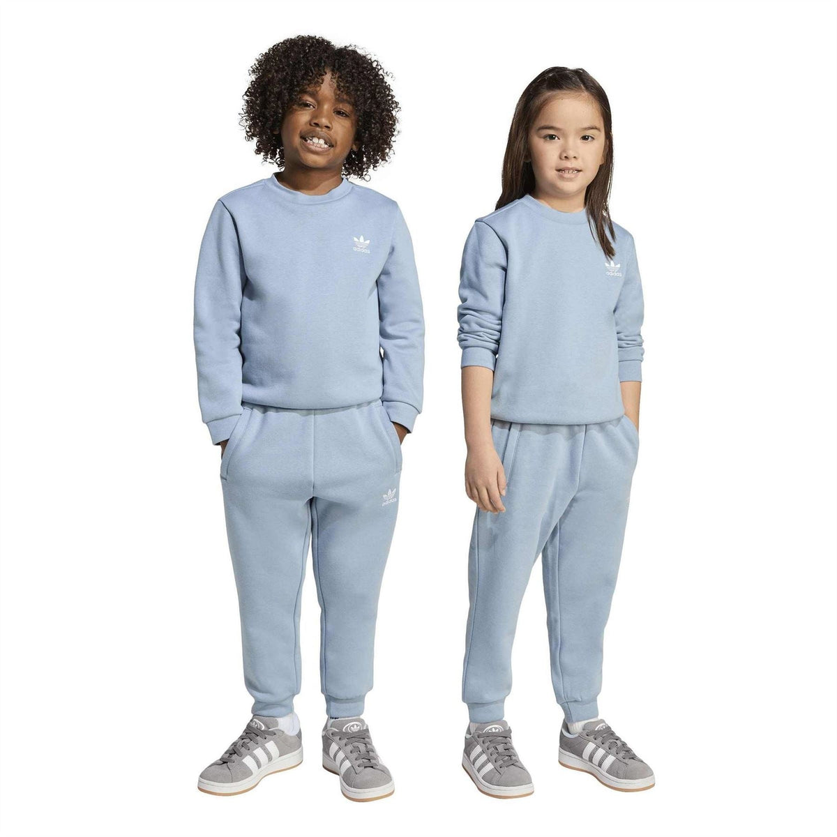 adidas Originals tracksuit set featuring a stylish matching jacket and pants in classic athletic style