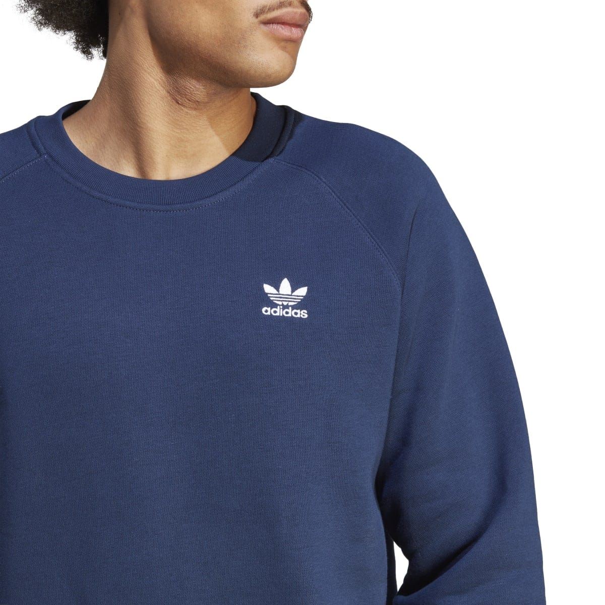 Navy crewneck sweatshirt with adidas trefoil logo on chest