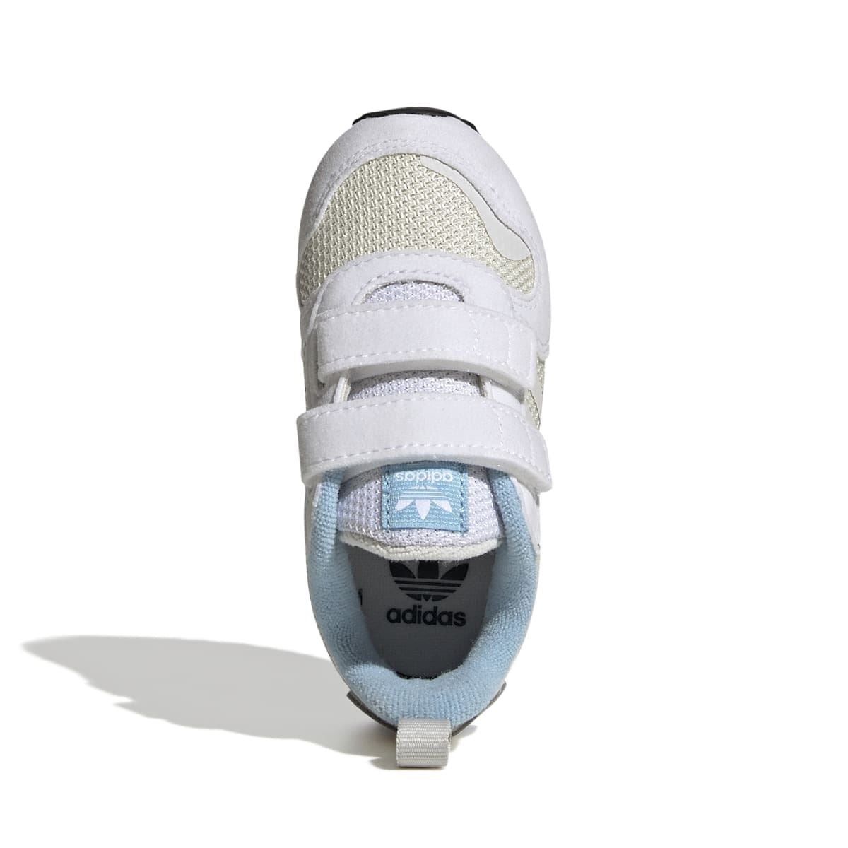Infant trainer front view with hook-and-loop closure, light-blue lining, and textured fabric