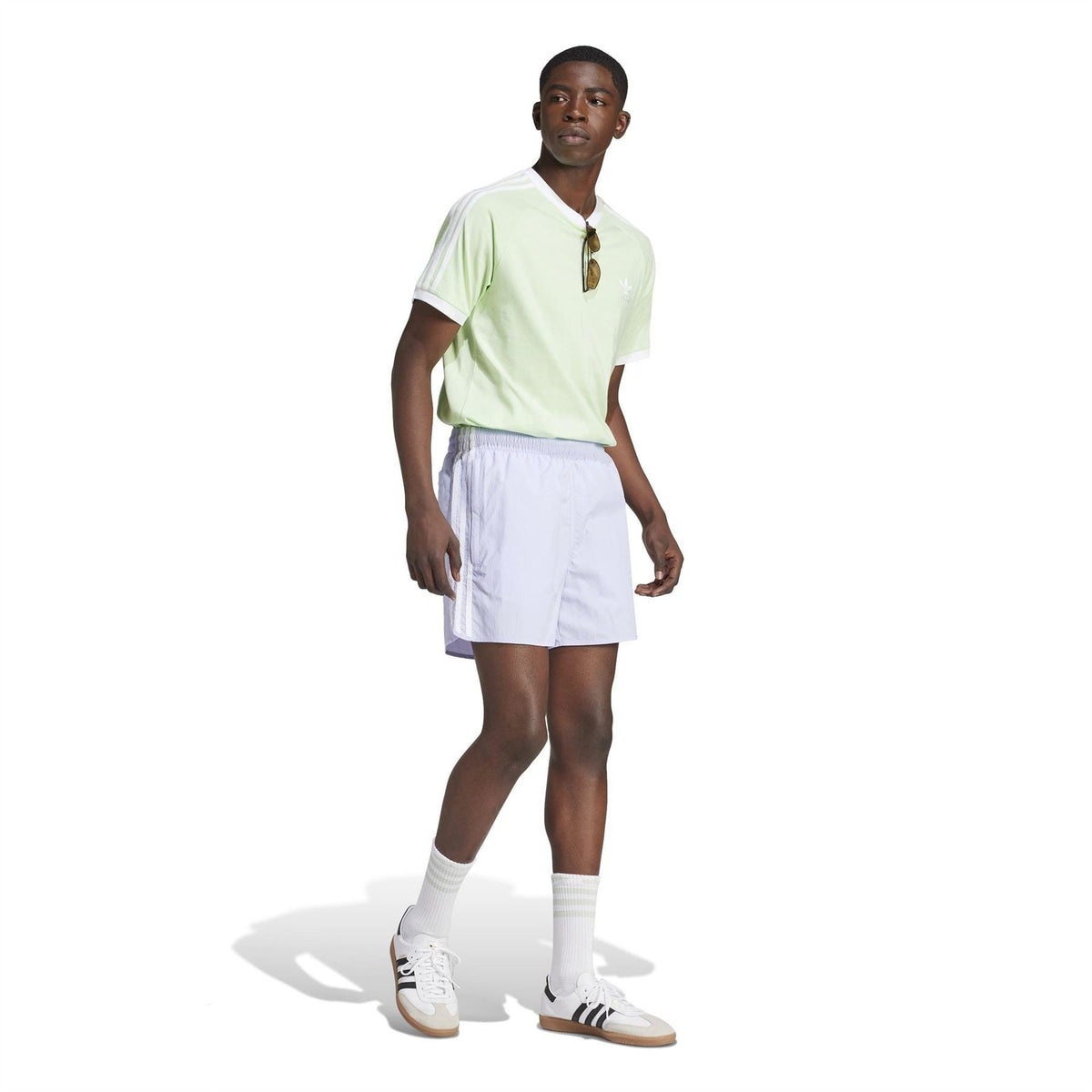 Light green adidas Originals crew neck T-shirt with chest logo and white adidas trefoil at front