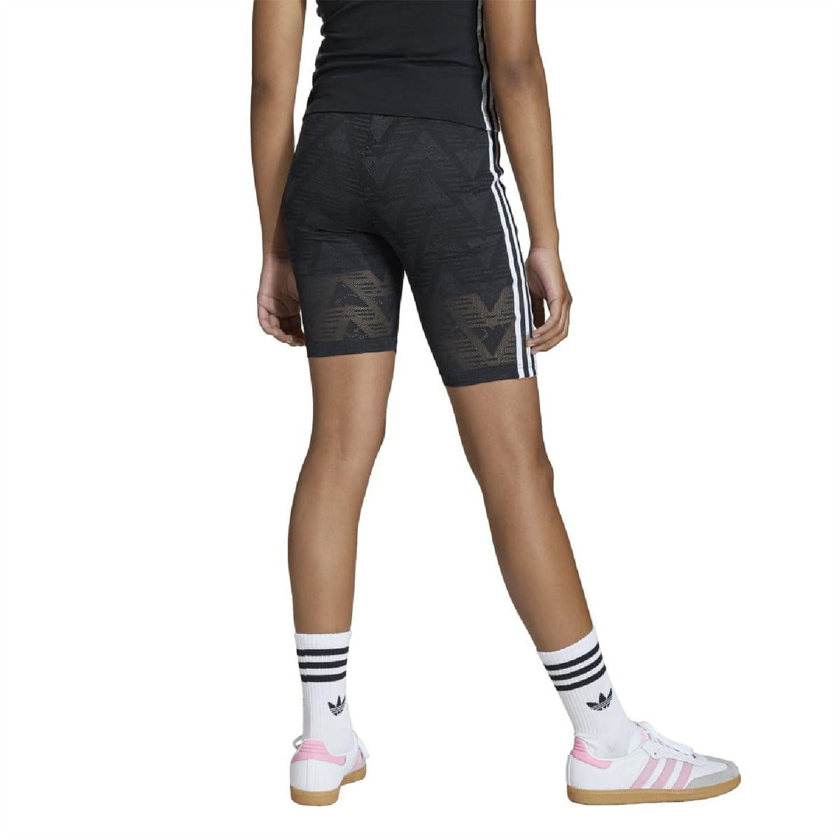 Juniors’ black geometric athletic shorts with white side stripes and adidas logo