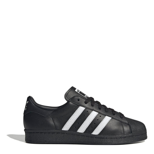 adidas Originals womens Superstar 82 sneakers, black leather with white triple stripes