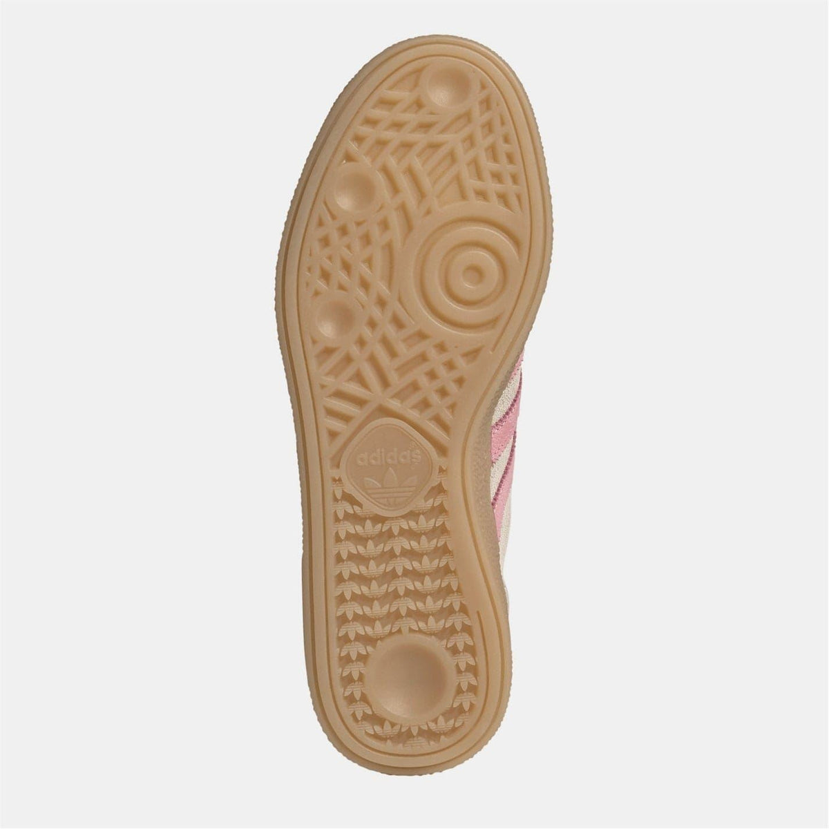 Beige gum rubber outsole for women’s Spezial shoes with tread pattern and logo.