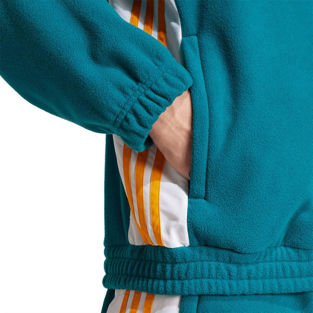 Teal fleece track jacket with elastic hem and white/yellow striped inner panel