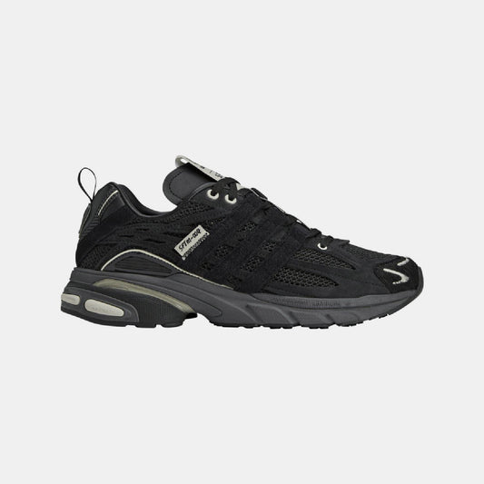 adidas Originals Adistar Cushion STFM trainers showing white and black athletic footwear with cushioned soles and stylish design