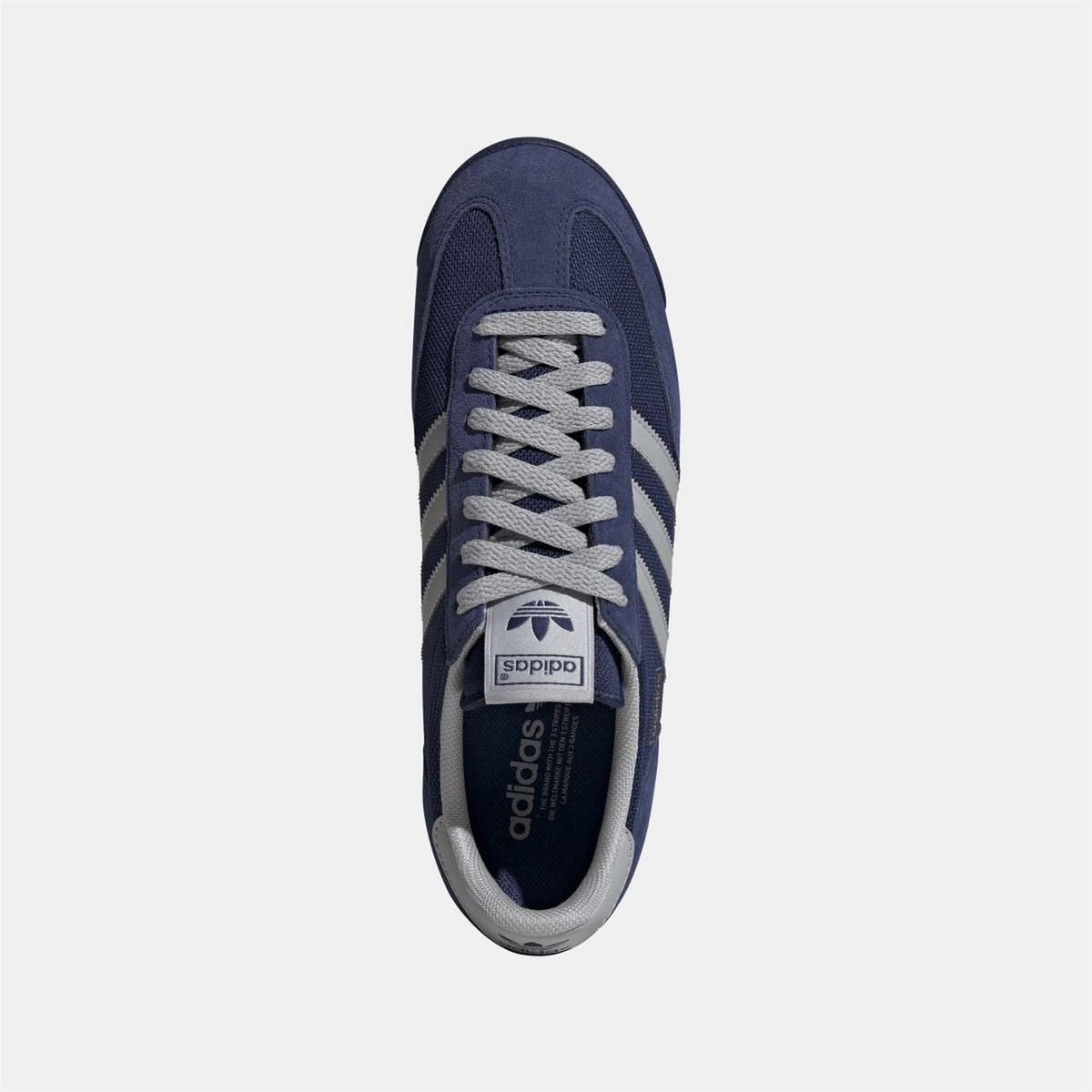Adidas Originals footwear showing stylish sneakers with classic design and brand logo on the side.