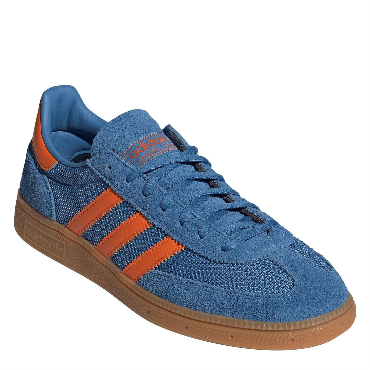 Blue Adidas low-top sneakers with orange accents, suede upper, lace-up and gum sole